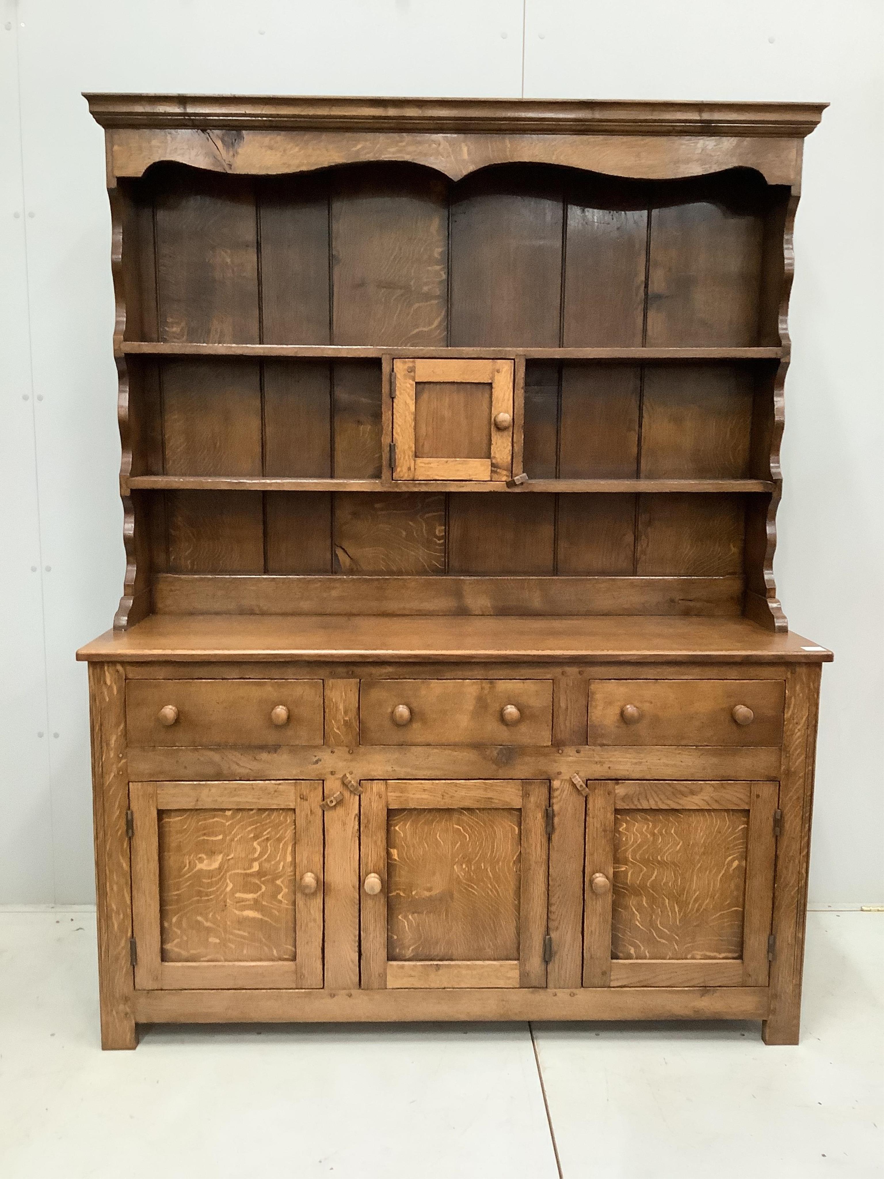 A near Contemporary 18th century style oak dresser, width 149cm, height 193cm. Condition - good